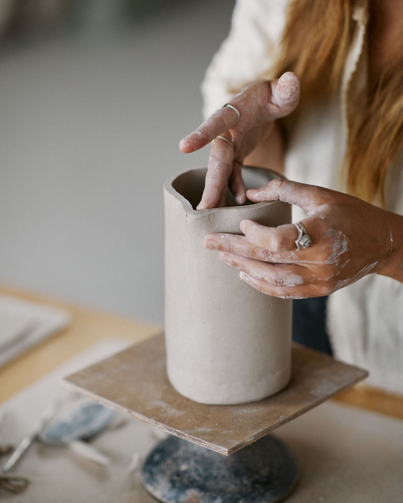 Students practicing pinch pot technique