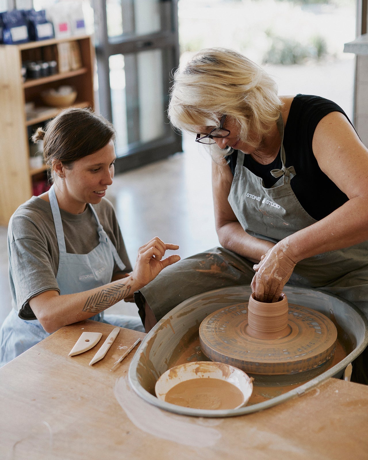 Overview of pottery wheels set up for intro class