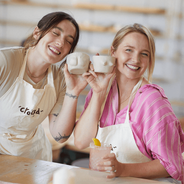 Guests making cheeky handmade mugs during the Crockd Booty Mugs and Margies pottery class.