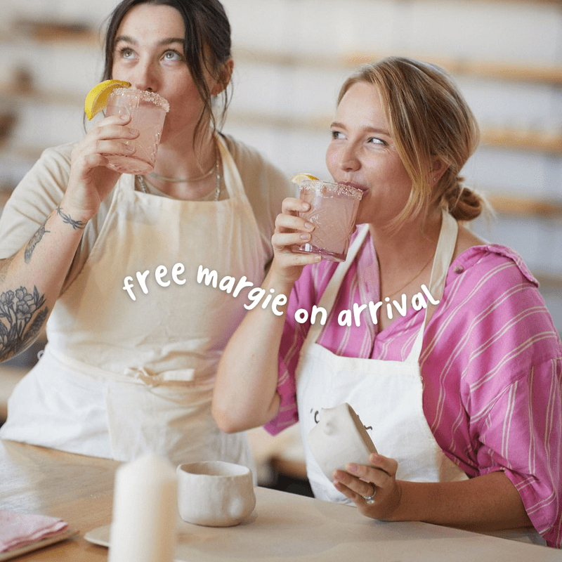 Guests making cheeky handmade mugs during the Crockd Booty Mugs and Margies pottery class.