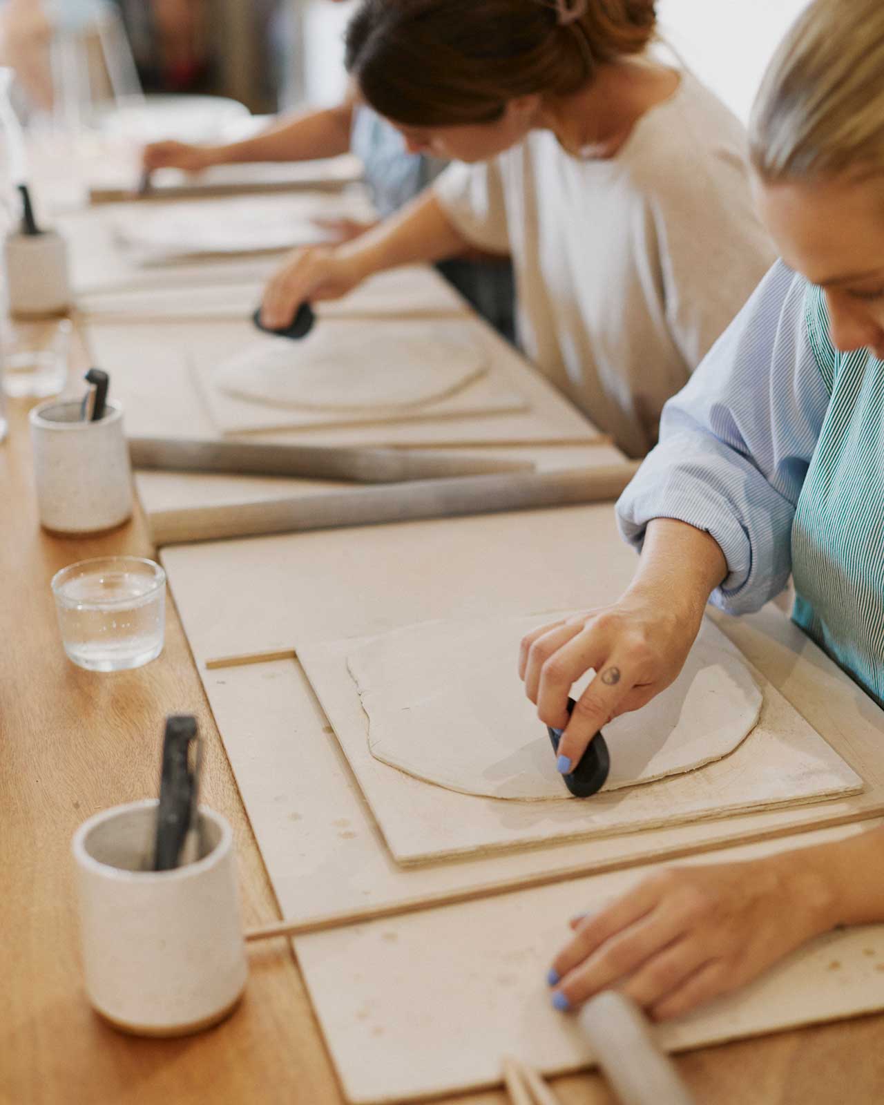 Instructor demonstrating breakfast set forming techniques